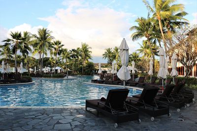 Chairs in swimming pool