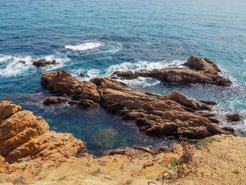 High angle view of rocks on beach