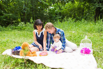 Friends sitting on grass