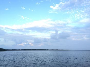 Scenic view of calm sea against blue sky