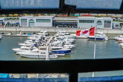 Boats moored in sea