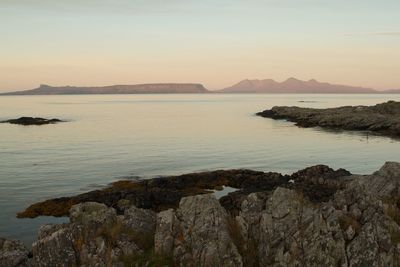 Scenic view of sea at sunset