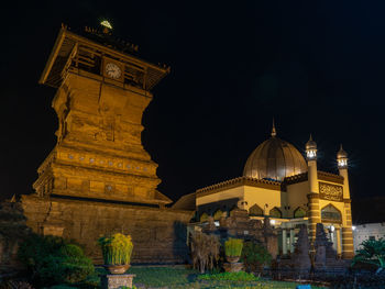 Illuminated historic building against sky at night