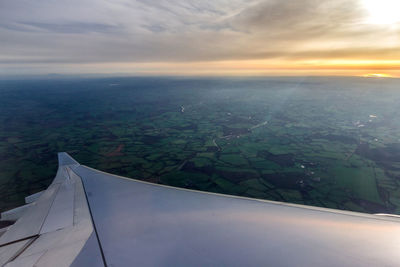 Aerial view of landscape against sky during sunset