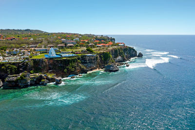 Scenic view of sea against clear blue sky