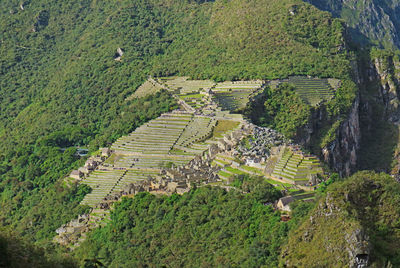 Machu picchu citadel view from huayna picchu mountain, shaped like condor incan sacred bird, peru