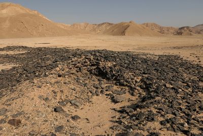 Scenic view of desert against sky