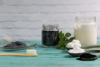 Close-up of glass of jar on table