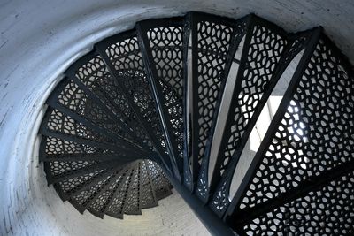 Directly below shot of spiral staircase in building