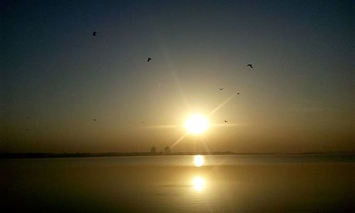 Scenic view of sunset over sea