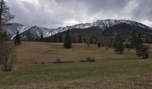 Scenic view of snowcapped mountains against sky