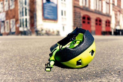 Close-up of toy on street in city