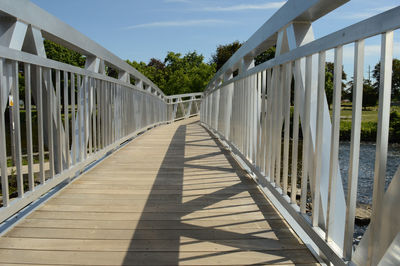 View of footbridge against sky