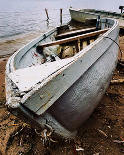 View of an abandoned boat on beach