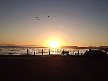 Scenic view of sea at sunset