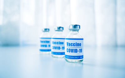 Syringes with new vaccine for covid-19 coronavirus, flu, infectious diseases. injection after clinic