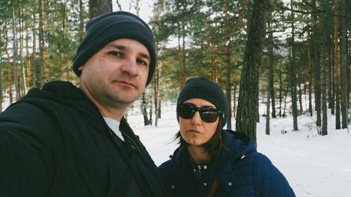 Portrait of couple wearing warm clothing during winter
