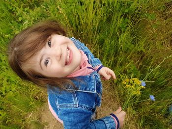 Portrait of smiling woman on field