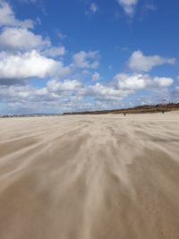 Scenic view of desert against sky