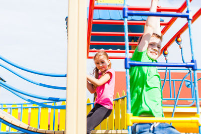 Portrait of cute girl playing at playground