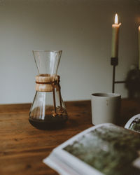 Close-up of glass jar on table