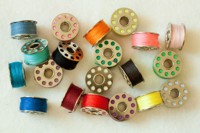 High angle view of various buttons on table