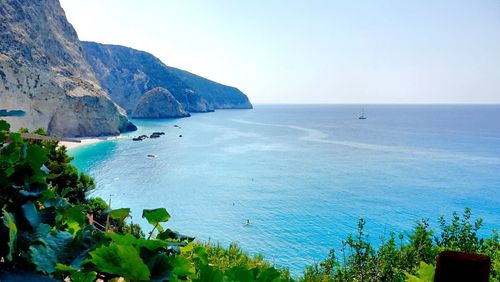 Scenic view of calm sea against clear sky