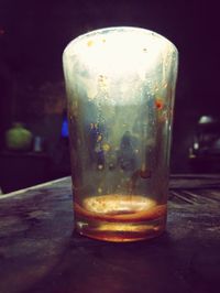 Close-up of beer glass on table