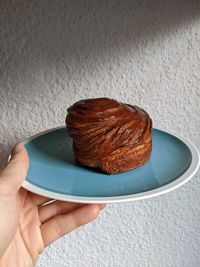 Cropped hand of person holding heart shape