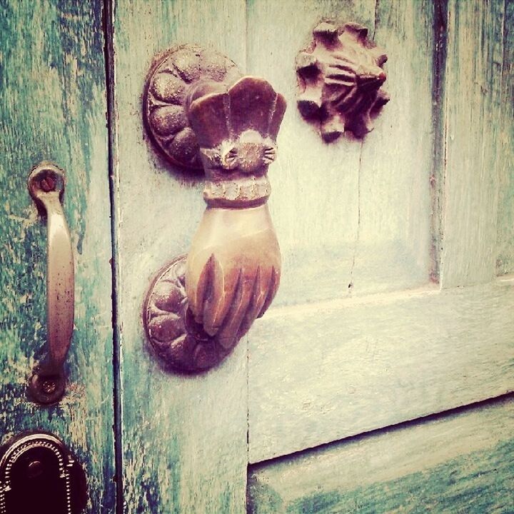 door, old, wood - material, weathered, art and craft, art, wooden, built structure, wall - building feature, close-up, creativity, closed, architecture, wood, rusty, animal representation, outdoors, day, building exterior, metal