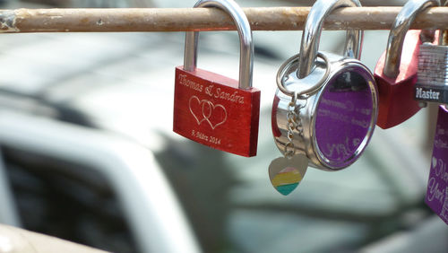 Close-up of padlock on railing