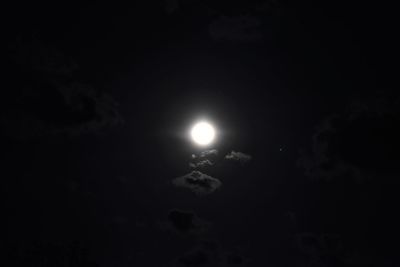 Low angle view of moon in sky