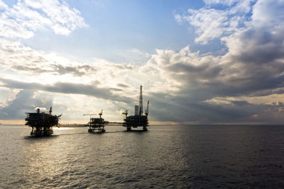 Seascape of silhouette oil production platform at offshore terengganu oil field