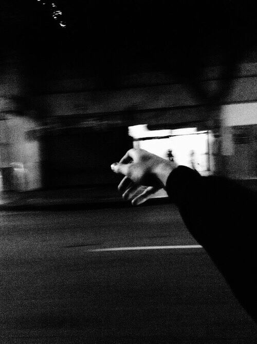 person, indoors, part of, holding, lifestyles, men, unrecognizable person, cropped, leisure activity, human finger, personal perspective, night, shadow, high angle view, street, illuminated