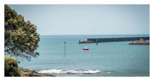 Scenic view of sea against clear sky