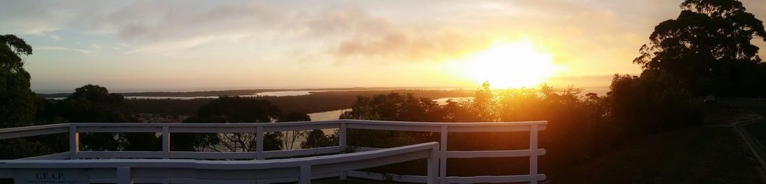 Panoramic view of sea against sky during sunset