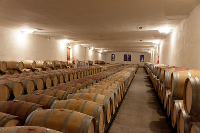 High angle view of barrels in warehouse