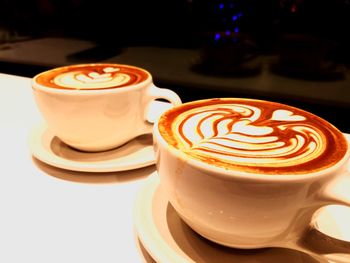 Close-up of cappuccino on table