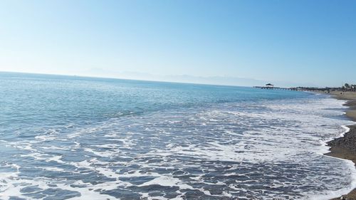 Scenic view of sea against clear sky