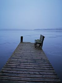 Dock in a frozen lake