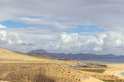 Panoramic view at sandy beach of risco del paso on canary island fuerteventura, spain