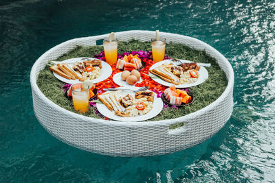 High angle view of fruits in bowl on table