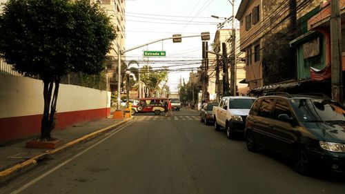 Cars on street in city