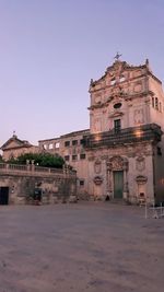 Low angle view of historical building against clear sky