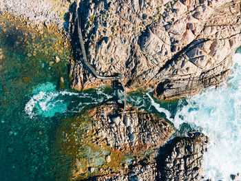High angle view of rock and water