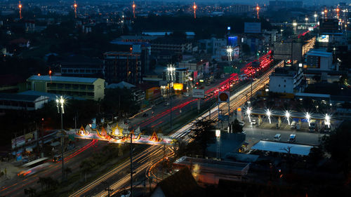 High angle view of illuminated city street at night