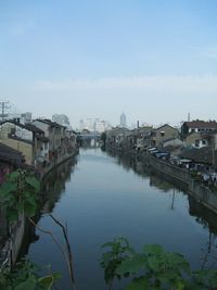 View of canal along buildings