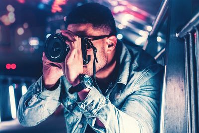 Portrait of man photographing