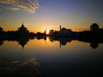 Sunrise and reflaction with boat