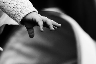 Cropped image of baby hand